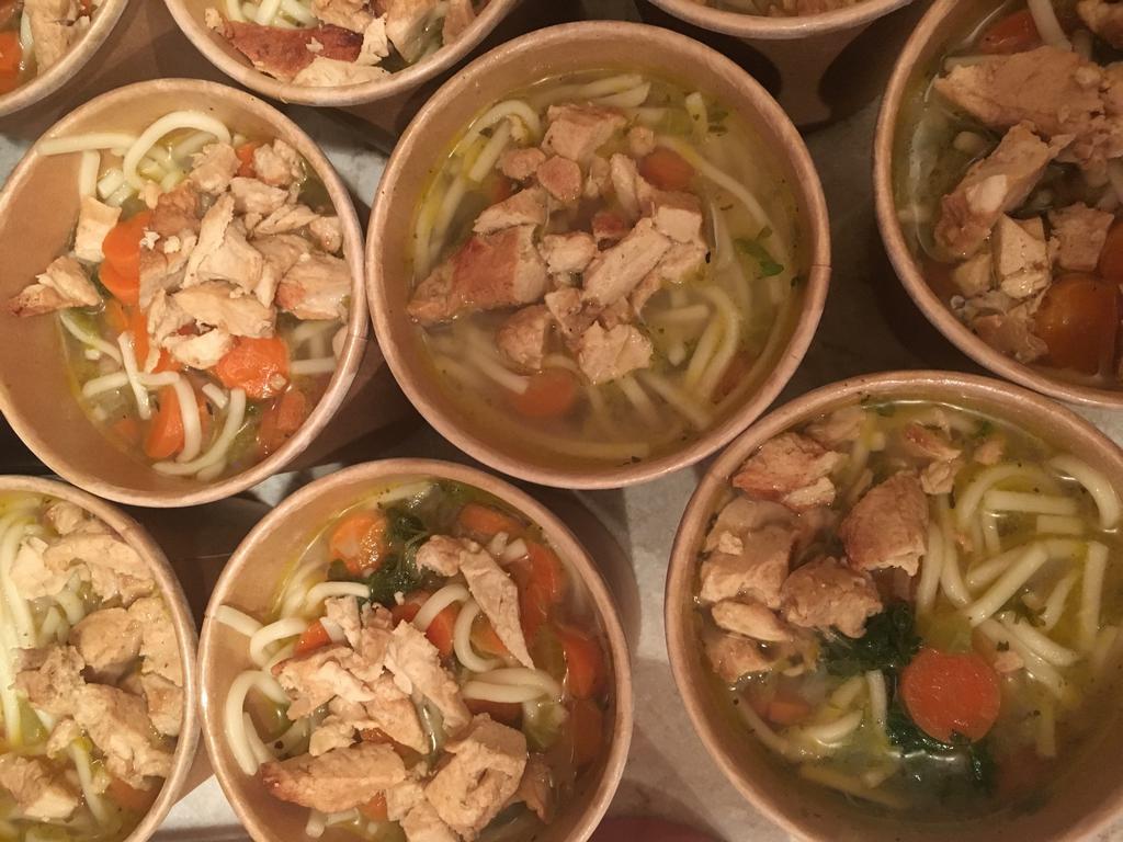 Chix-Less Noodle Soup · Vegan chicken tenders sauteed with fresh onions, garlic, celery, carrots, parsley, simmered with veg chicken broth and seasonings. Poured over Japanese noodles.