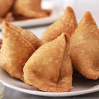 Punjabi Samosa · Savory pastry made with potatoes, peas and some spices.