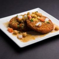 Aloo Tikki · Amazing potato croquettes, shallow fried to perfection. Potatoes and onions in a heavenly mix.