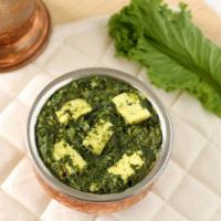 Palak Paneer · Spinach and cottage cheese.