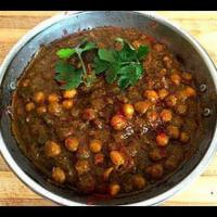 Chana Saag · Smooth spinach cooked with tender chickpeas.