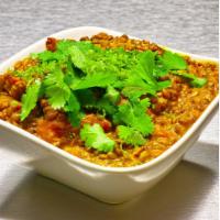 Masoor Daal · Pink lentils in onion, tomato and garlic.