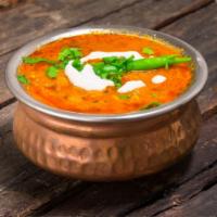 Daal Tadka · Yellow lentils tempered with cumin, mustard seeds, curry leaved and dried red pepper.