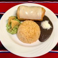 Bisteck Chimichanga · Steak. Served with rice, black beans, guacamole and chihuahua cheese. 