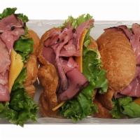 Roast Beef Croissant Sandwiches, 3 Ct · Kretschmar roast beef, sliced Cheddar cheese, green leaf lettuce on a mini croissant.