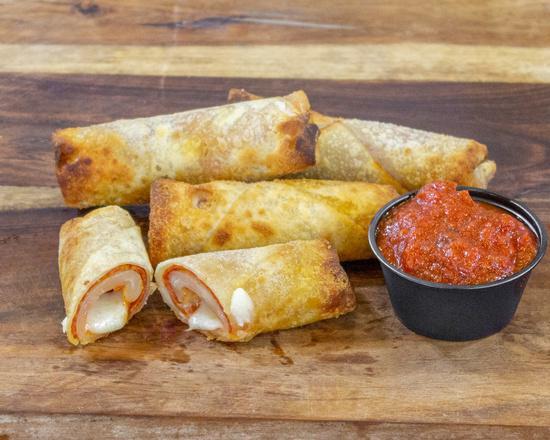 Pizza Logs · Pepperoni and mozzarella, with a crisp shell and marinara dipping sauce.