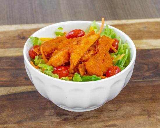 Chicken Finger Salad · Romaine, humanely-raised, breaded chicken, carrots, tomatoes, and your choice of ranch or blue cheese dressing.