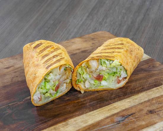 Buffalo Chicken Wrap · Humanely raised breaded chicken, pepper jack cheese, blue cheese crumbles, tomatoes, romaine, with hot, medium, mild, or BBQ sauce.