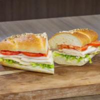 Turkey Sub · Humanely raised turkey, with a touch of house-made garlic oil, with your choice of cheese an...