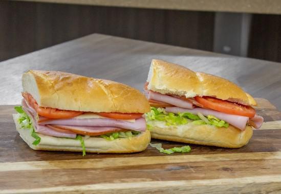 Ham and Cheese Sub · Humanely raised ham, with a touch of house-made garlic oil, with your choice of cheese and additional toppings.