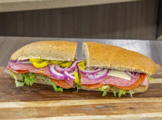 Italian Sub · A touch of house-made garlic oil, deli pepperoni, salami, and ham, with your choice of cheese and additional toppings.