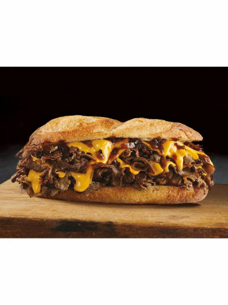 Original Philly Cheesesteak · Philly Steak, grilled onions and swiss american cheese, served on a Hoagie Roll.