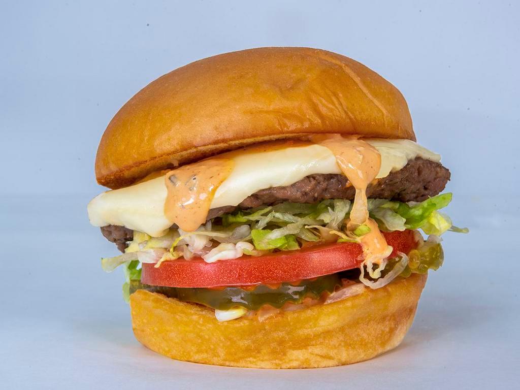 Impossible Burger · Pickles, lettuce, tomato, onion, white American cheese, and secret sauce. Served on King's Hawaiian.