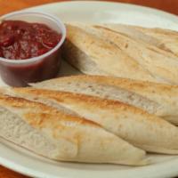 6 Piece Dipsticks · 6 big, handmade dipsticks baked fresh and served with your choice of marinara, ranch or Alfr...