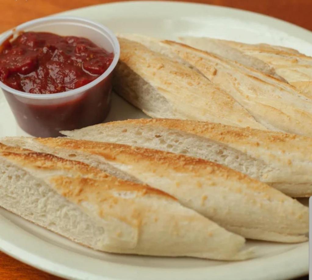 6 Piece Dipsticks · 6 big, handmade dipsticks baked fresh and served with your choice of marinara, ranch or Alfredo dipping sauce.