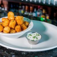 Tater Tots · Crispy tots served with a side of marinara. Choose original, cajun or spicy garlic and parm ...