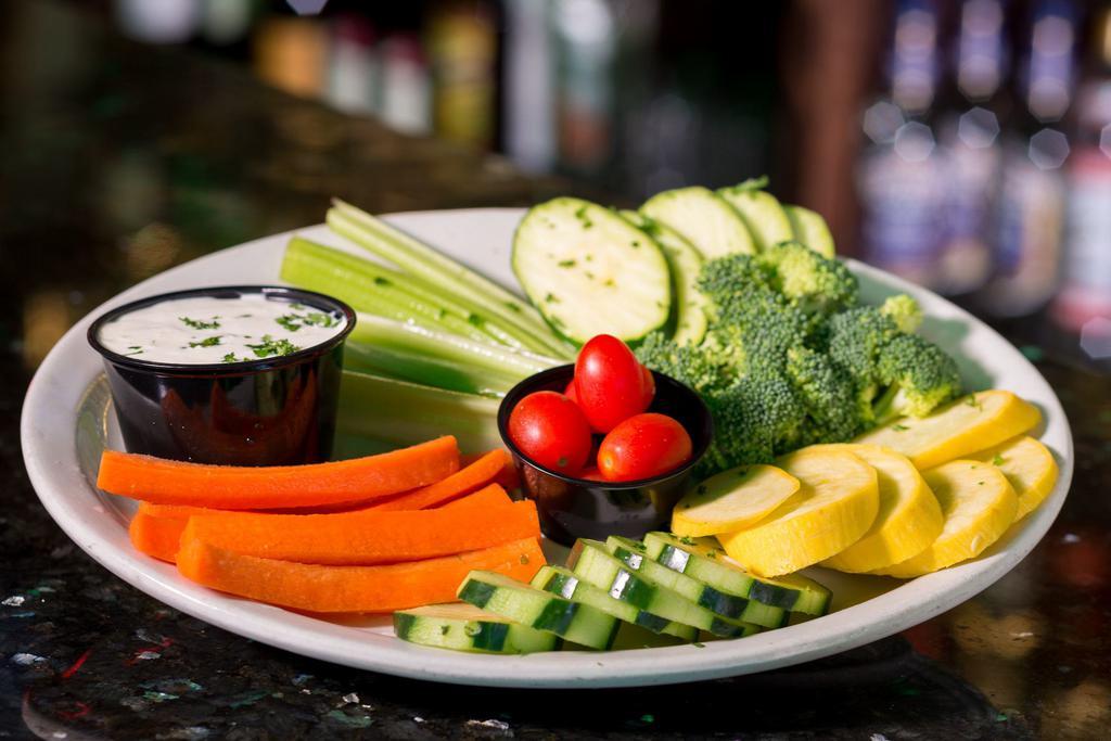 Ranchy Veggie Tray · Fresh-cut carrots, yellow squash, celery, zucchini, broccoli, tomatoes, and cucumber dipping sticks served with ranch or bleu cheese.