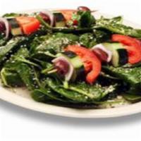 Garden Salad · Fresh greens, cucumbers, onions, tomatoes and herbed croutons with choice of salad dressing.