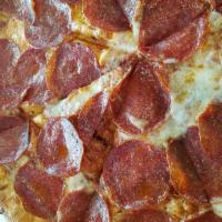 Pepperoni Pie · Spicy circular meat disks. 
