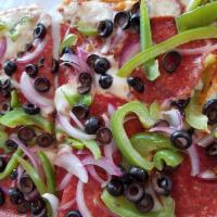 Traditional Pizza · Pepperoni, green peppers, red onions, and black olives.