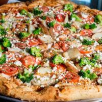 Rustic Pie · Baby red potatoes, Roma tomatoes, chopped garlic and broccoli with a sprinkle of feta cheese...