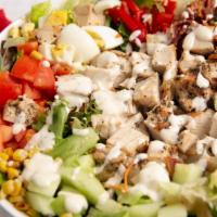 Cobb Salad · Grilled chicken breast, red pepper, roasted corn, avocado, bacon, diced egg, bleu cheese, an...