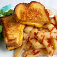 Grilled Cheese · On thick cut challah with french Fries.