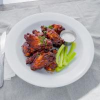 Wings · Dry, mild, hot, sweet chili, BBQ or sesame. Served with bleu cheese and celery.