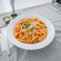 Penne Alla Vodka · Penne topped with vodka cream sauce, sweet peas and prosciutto. Add shrimp and chicken for a...