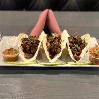 13. Steak Taco · Traditional Mexican Corn or Flour Tortilla tacos with Steak diced cut.