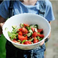Garden House Salad · Fresh salad made with crispy leaf lettuce, romaine lettuce, cucumbers, carrots, tomatoes and...