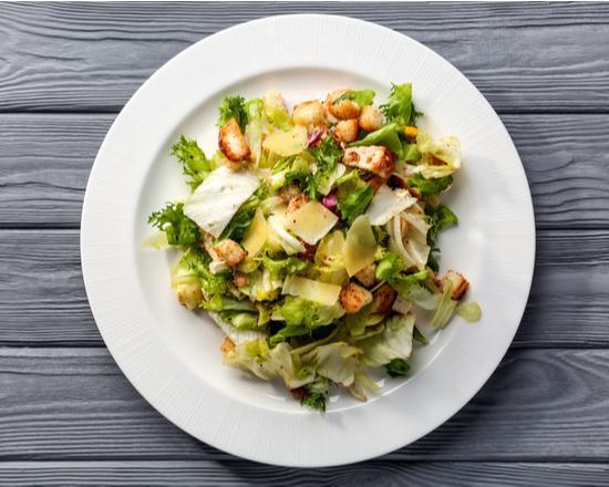 Caesar Salad · Fresh salad made with romaine lettuce, sliced Romano cheese and homemade garlic roasted croutons.
