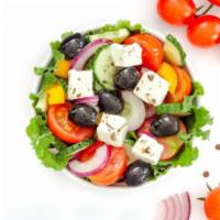 Greek Salad · Fresh salad made with Romaine lettuce, feta cheese, stuffed grape leaves, tomatoes, red onio...
