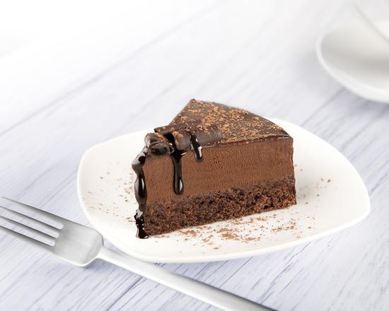 Triple Chocolate Cake · Fresh slice of triple chocolate cake.