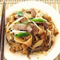 54. Stir fried Flat Rice Noodles With Beef OR Chicken · Stir fried flat noodle. With beef or chicken.