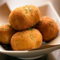 Crocche di Patate · fried salted potato fritters with a salumi, pistachio mortadella and scamorza cheese and Mar...