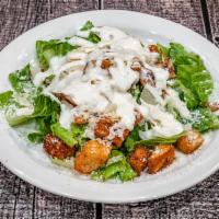 Caesar Salad · Romaine and lettuce with croutons.