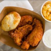 12 Piece Chicken Tender Family Meal · 12 pieces of juicy chicken tenders with 2 large signature sides and 8 hot, buttery biscuits.