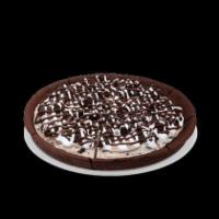 Oreo Cookies and Cream Polar Pizza · An ice cream treat you eat like pizza! A double fudge brownie crust with Oreo cookies and cr...