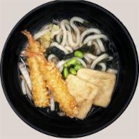 Soup Udon · Kombu dashi soup with tsuyu sauce, tempura shrimp, seaweed, fried bean curd, edamame and veg...