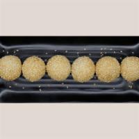 Sesame Ball · Served with red bean paste filling.