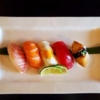 Sushi Sampler  · 5 pieces. Assorted raw fish. 