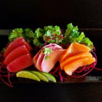 Sashimi Sampler  · 9 pieces of tuna, salmon, yellowtail. 3 pieces each. 