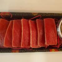 Tuna Tataki · Served seared tuna with vegetable and ponzu sauce. 