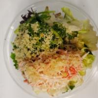 Kani and Seaweed Salad  · Spicy imitation crab salad and seaweed salad with house dressing on fresh greens. 