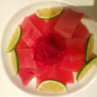 Tuna Don  · Fresh tuna sashimi over rice. 