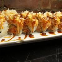 Jackpot Roll · In: spicy tuna, crab, cucumber. Top: seared spicy salmon, spicy mayo, eel sauce, crunch.