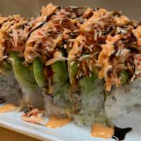 Kingdom Roll · In : spicy tuna, spicy salmon, cucumber. Top: avocado, spicy crab, spicy mayo, eel sauce.