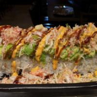 O.M.G Roll · In: shrimp tempura, lobster salad. Top: mixed avocado, crunch, masago, crab, scallion, sp ma...