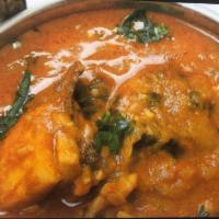Chicken Vindaloo · Served with rice .Chicken cooked with curry, potatoes and a splash of vinegar 